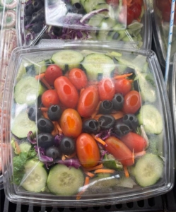 a salad in a plastic container
