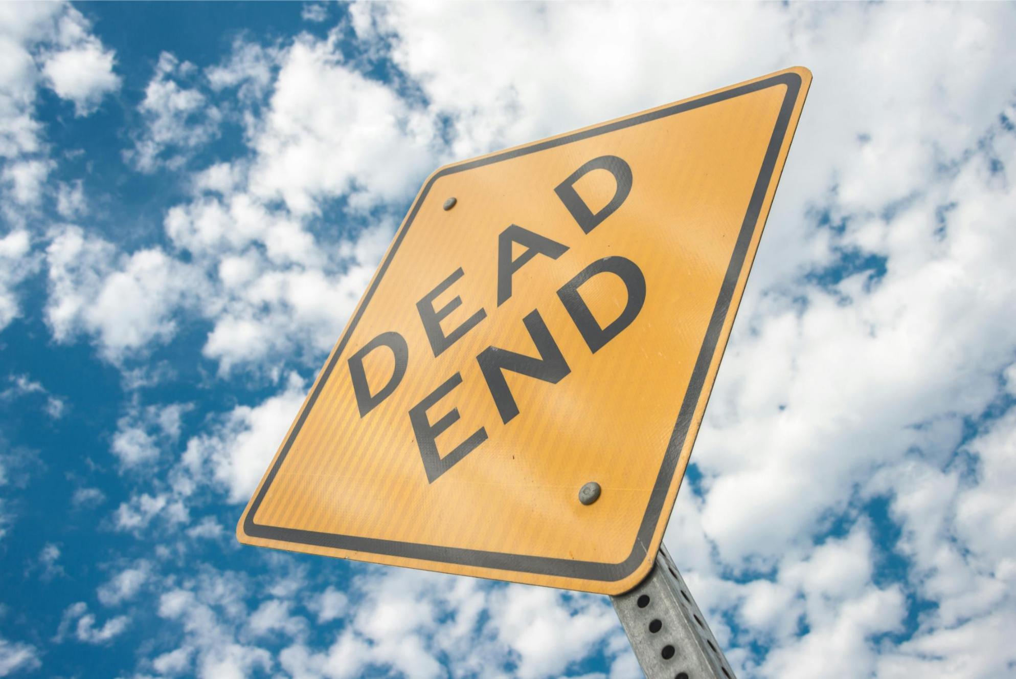 A close-up of a road sign Photo by Pixabay: https://www.pexels.com/photo/yellow-dead-end-sign-during-day-time-163728/