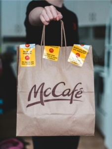 A person holding a paper bag Photo by Erik Mclean: https://www.pexels.com/photo/person-holding-brown-paper-bag-4061388/