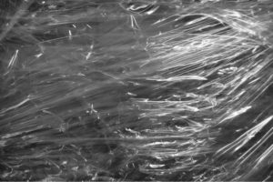 A close-up of a plastic wrap Photo by Ярослав Игнатенко: https://www.pexels.com/photo/close-up-of-sweets-12246957/