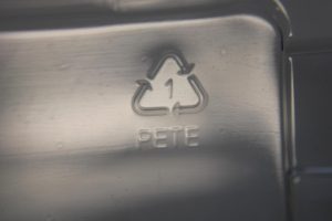 a resin indicator one on a plastic package of PET