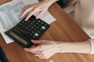 a person using a calculator 