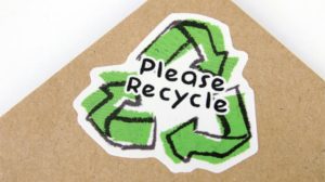 a sticker saying please recycle. photo by: https://unsplash.com/@stickerit_co?utm_content=creditCopyText&utm_medium=referral&utm_source=unsplash