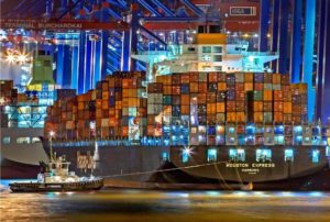 a barge full of shipping containers. source: pexels-julius-silver-240301-753331