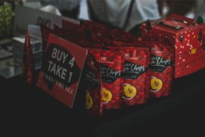 bags of banana chips Photo by Muffin Creatives: https://www.pexels.com/photo/assorted-chip-packs-on-black-surface-in-tilt-shift-photography-1616036/