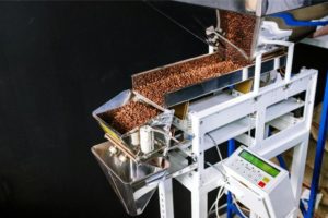 an automated coffee bean machine. Photo by cottonbro studio: https://www.pexels.com/photo/white-and-green-metal-frame-4820816/