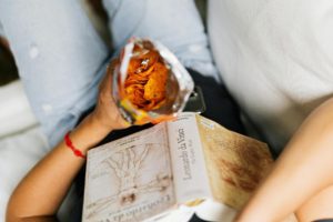 a person eating a bag of chips. Photo by Karola G: https://www.pexels.com/photo/a-person-eating-a-bag-of-chips-4960235/